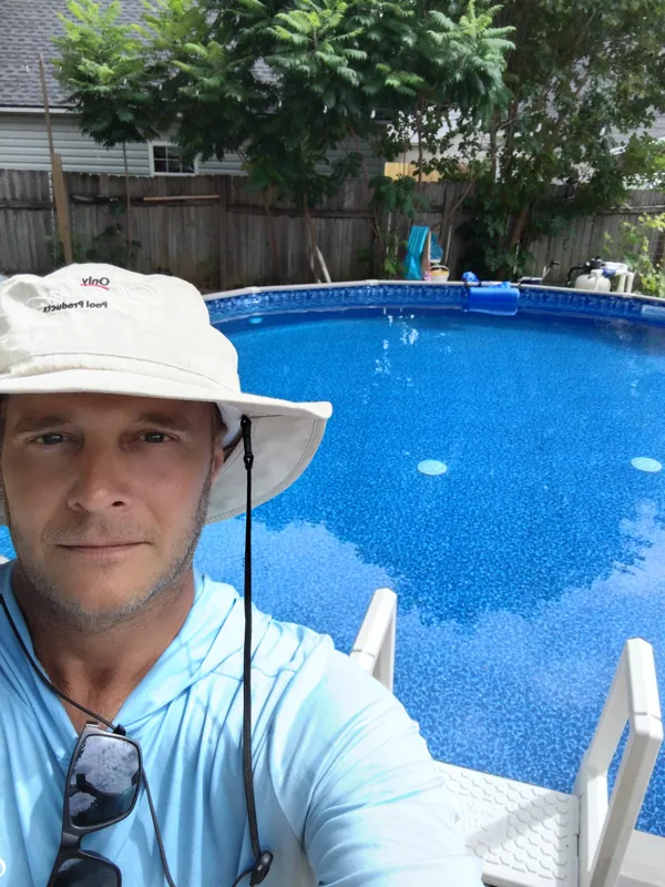 Watermark Pools on the job, poolside at a finished above-ground pool